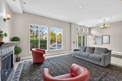 Living Room Photo of 312 15380 102a Avenue, Surrey, BC