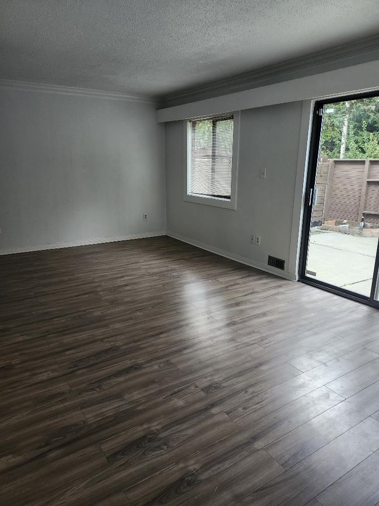 Family Room Photo of 121 14159 104 Avenue, Surrey, BC