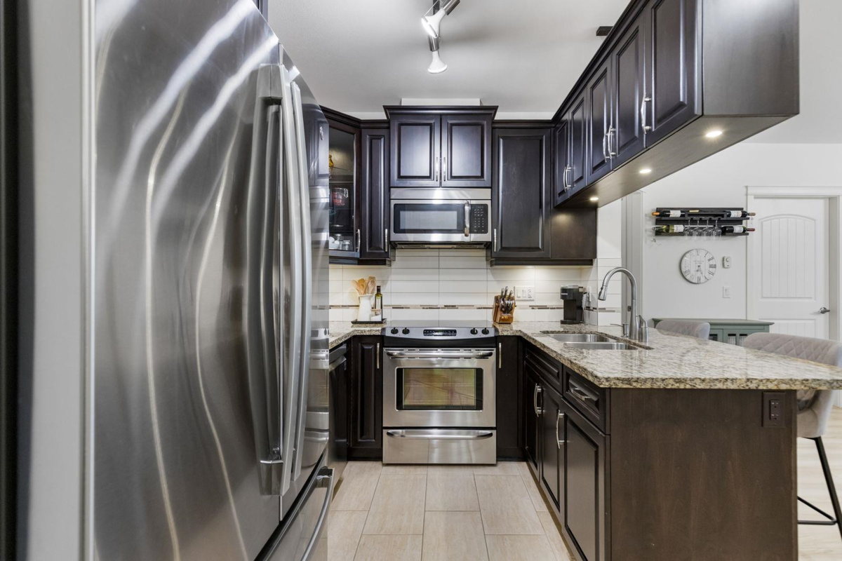 Living Room Photo of 215 12565 190a Street, Pitt Meadows, BC