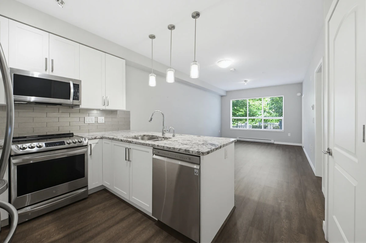 Living Room Photo of 105 6490 194 Street, Surrey, BC