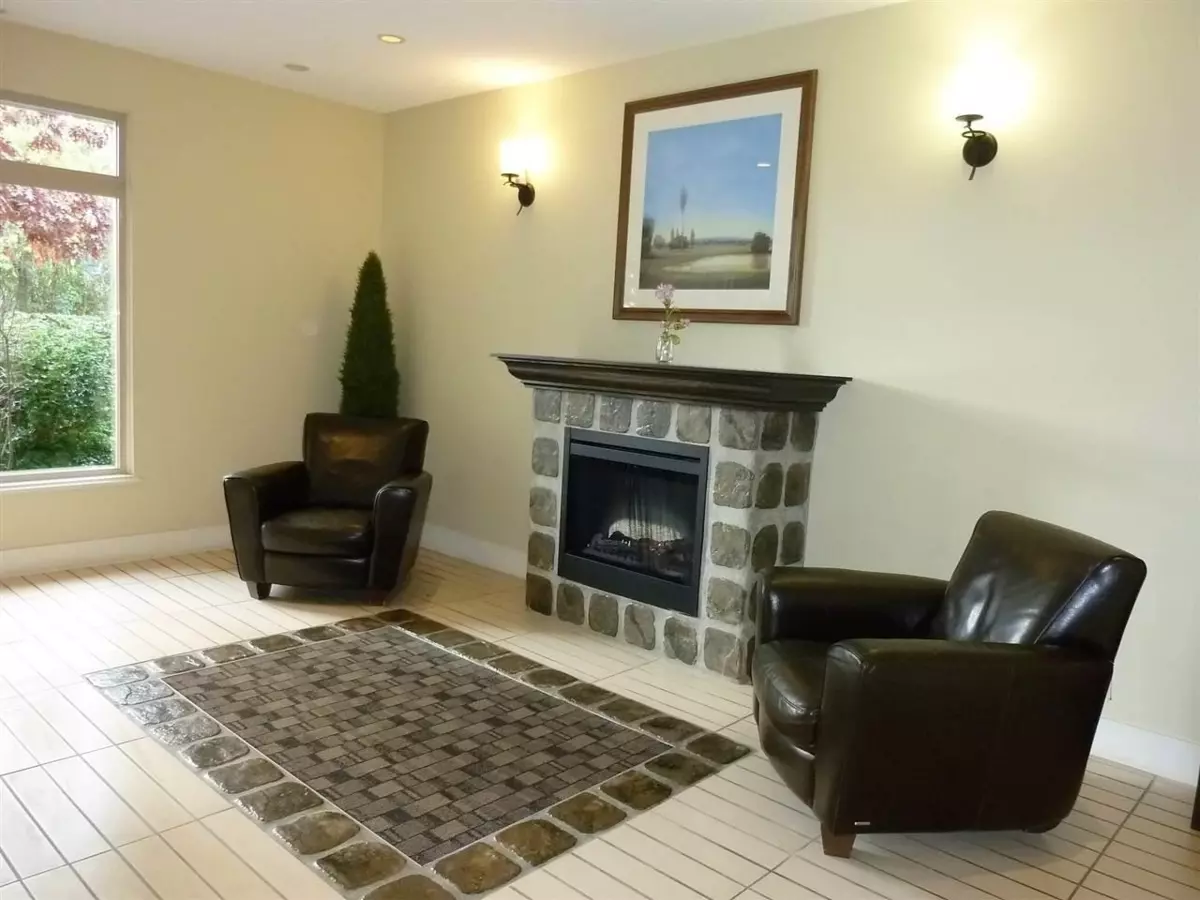 Living Room Photo of 405 15385 101a Avenue, Surrey, BC
