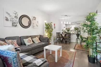 Family Room Photo of 107 7478 Byrnepark Walk, Burnaby, BC