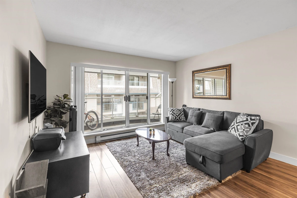Living Room Photo of 210 13771 72a Avenue, Surrey, BC