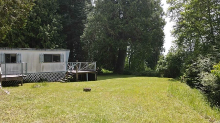 Laundry Room Photo of 8127 Redrooffs Road, Halfmoon Bay, BC