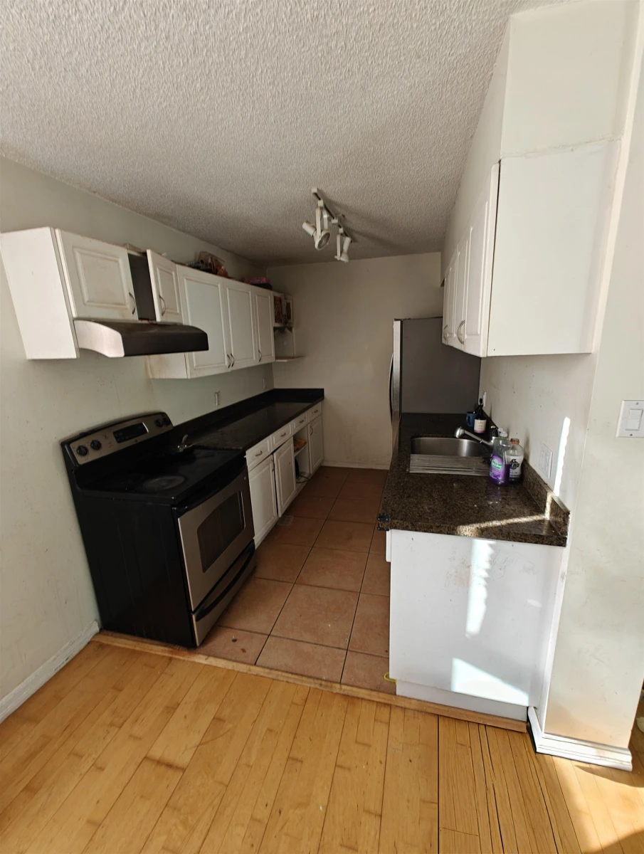 Living Room Photo of 307 5645 Barker Avenue, Burnaby, BC