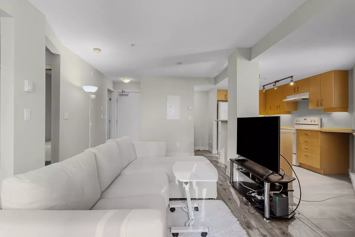 Living Room Photo of 331 10838 City Parkway, Surrey, BC