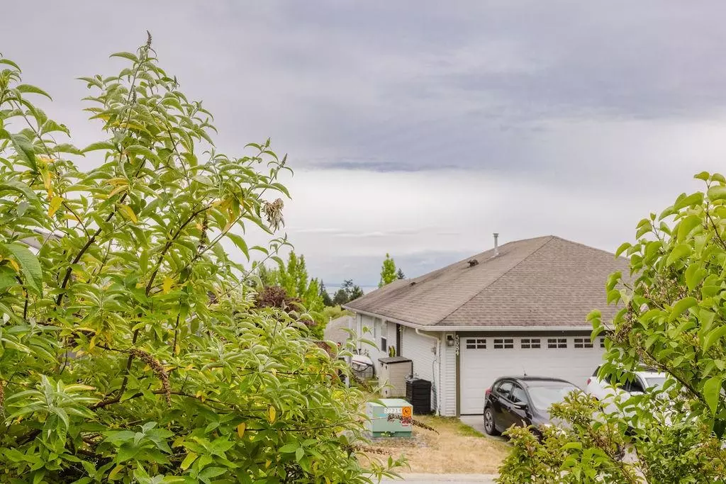 Exterior Rear Photo of 5687 Emily Way, Sechelt, BC
