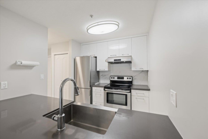 Family Room Photo of 204 8680 Lansdowne Road, Richmond, BC