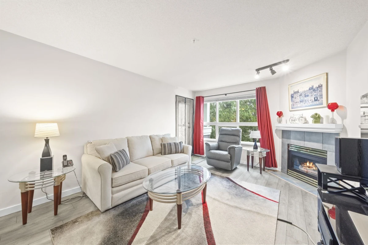 Living Room Photo of 312 8068 120a Street, Surrey, BC