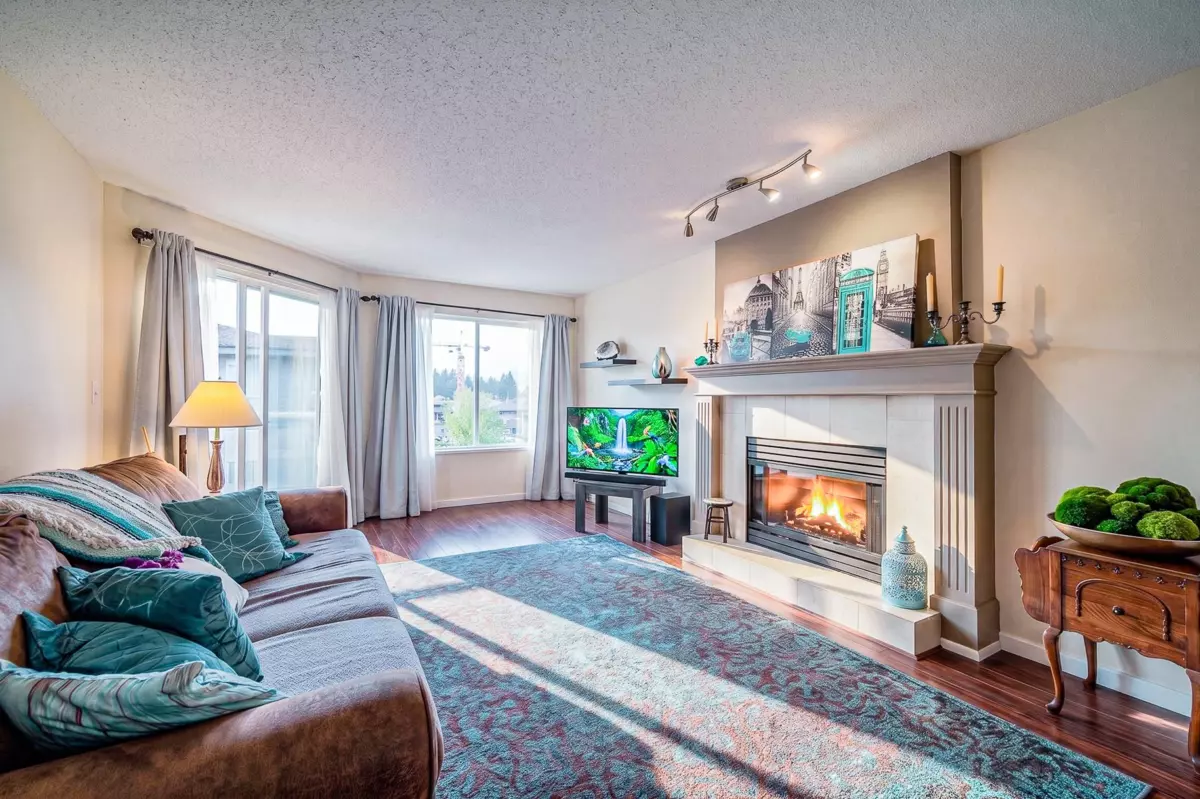 Living Room Photo of 305 1167 Pipeline Road, Coquitlam, BC