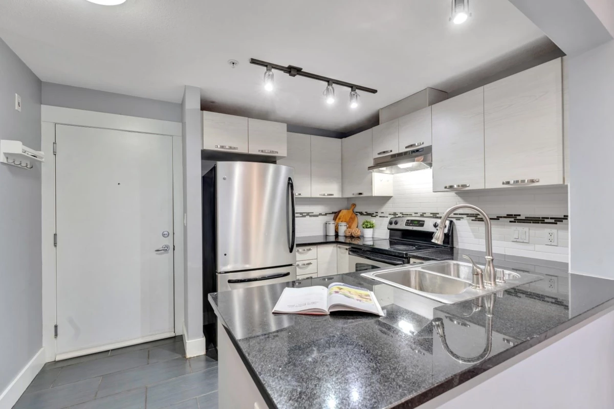 Family Room Photo of 308 7478 Byrnepark Walk, Burnaby, BC