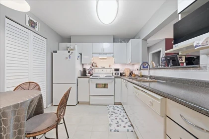 Laundry Room Photo of 109 6385 121st Street, Surrey, BC